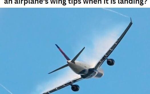 What is the white smoke that trails behind an airplane's wing tips when it is landing?