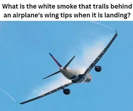 What is the white smoke that trails behind an airplane's wing tips when it is landing?